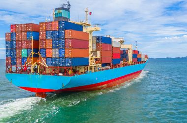 container ship leaving the industrial port, import and export bu